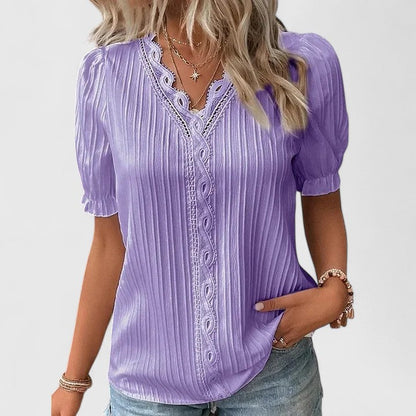 Modern women's V-neck blouse, relaxed fit. Stylish hollow sleeves make this a versatile casual shirt.