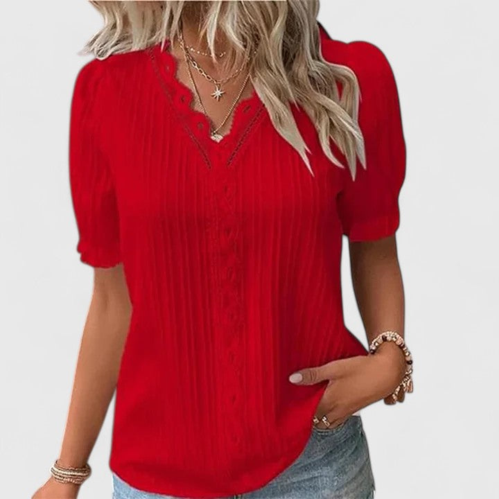 Stylish V-neck blouse for women, featuring trendy hollow short sleeves. Perfect modern casual shirt.