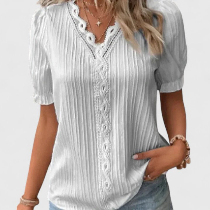 Womens elegant V-neck blouse, a chic summer top with stylish hollow sleeves. Comfortable & versatile.