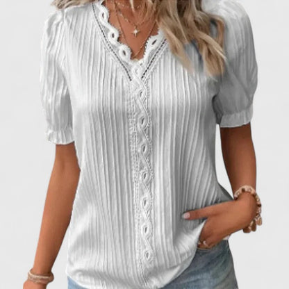 Womens elegant V-neck blouse, a chic summer top with stylish hollow sleeves. Comfortable & versatile.