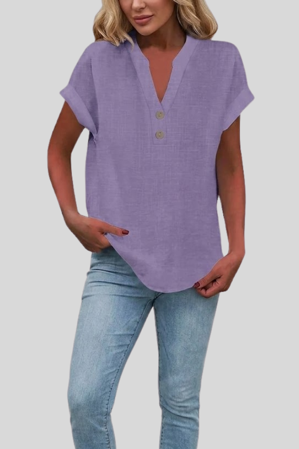 Chic women's short sleeve V-neck top, button-front, versatile for casual elegant summer style.
