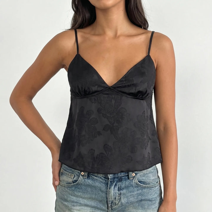 Stylish women's cropped V-neck cami in a delicate floral jacquard fabric. Ideal summer fashion for versatile day-to-night outfits.