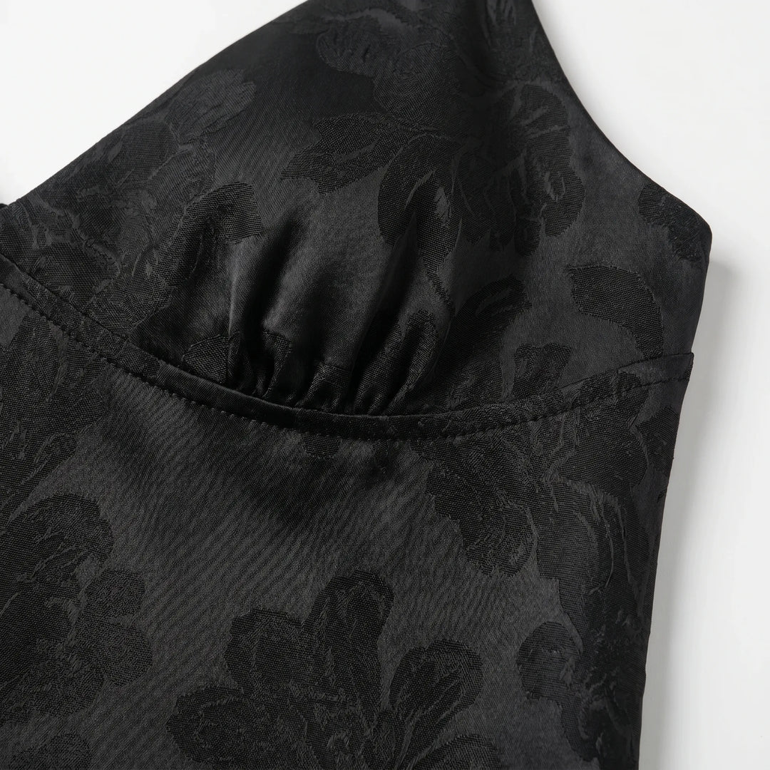 Chic V-neck spaghetti strap cami for women. This elegant cropped top features a subtle floral jacquard design, great for summer.