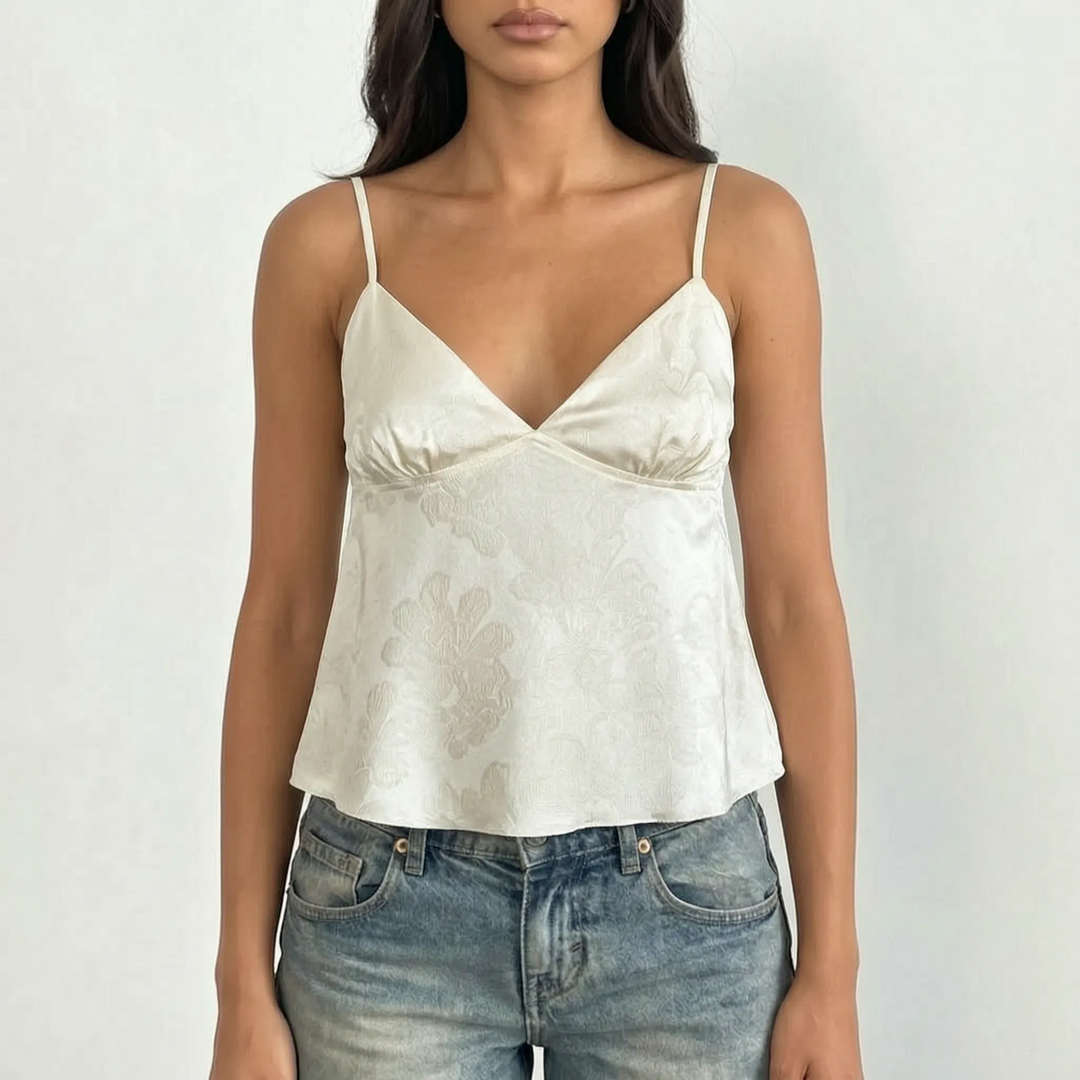 Comfortable & elegant women's V-neck camisole. Cropped design with floral jacquard fabric & spaghetti straps, perfect for summer.