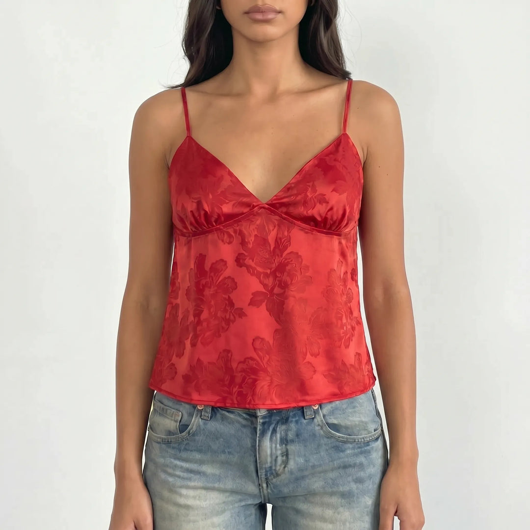 Women's elegant floral jacquard V-neck cami top. Cropped with delicate spaghetti straps, a versatile clothing piece for any occasion.