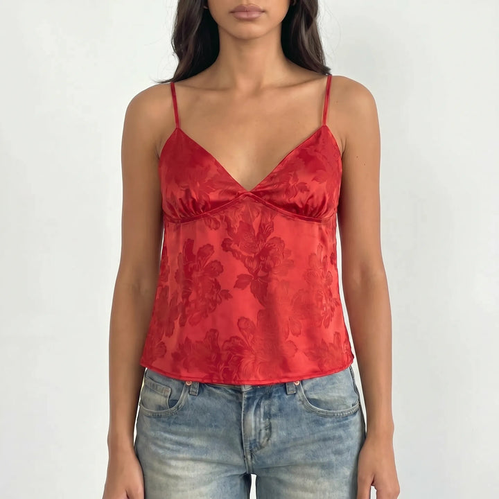 Women's elegant floral jacquard V-neck cami top. Cropped with delicate spaghetti straps, a versatile clothing piece for any occasion.