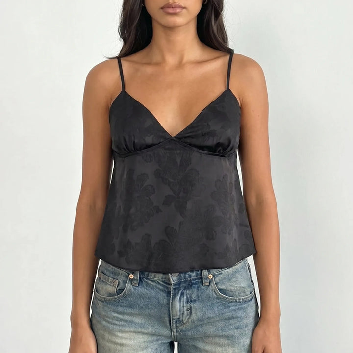 Modern women's V-neck cami top. This elegant floral jacquard cropped camisole with spaghetti straps is ideal for summer fashion.