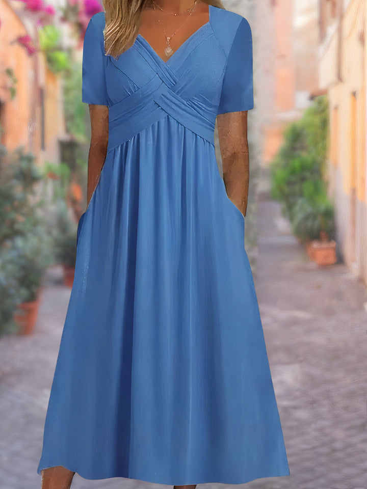 Stylish women's elegant V-neck crisscross cocktail midi dress, a must-have for any fashion-forward wardrobe.