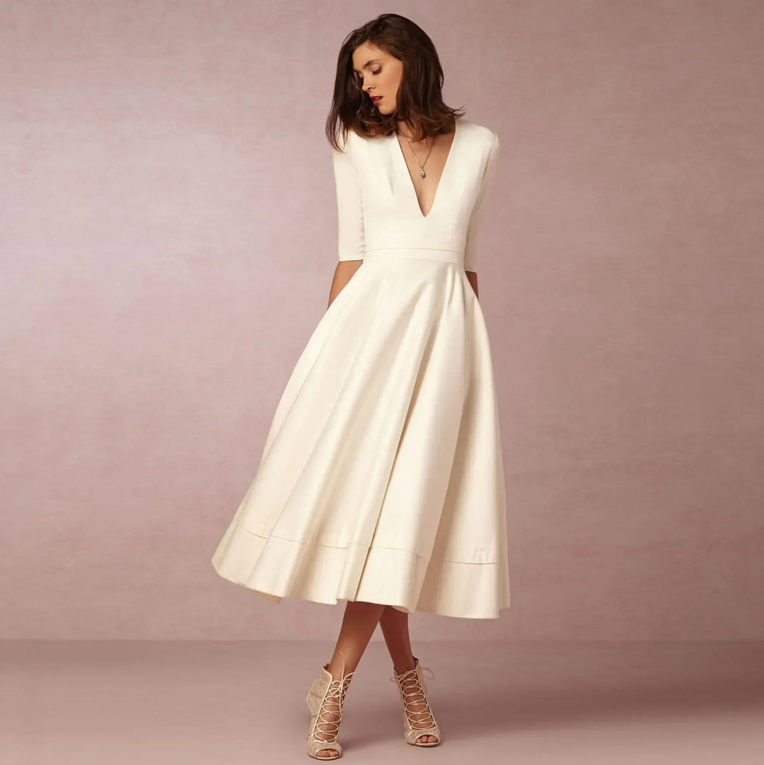 Elegant women's V-neck elbow-sleeve midi dress for sophisticated style.