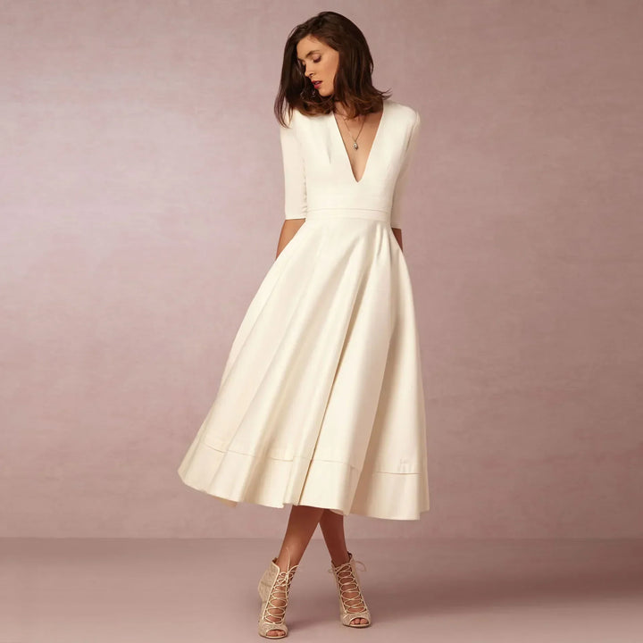 Elegant women's V-neck elbow-sleeve midi dress for sophisticated style.