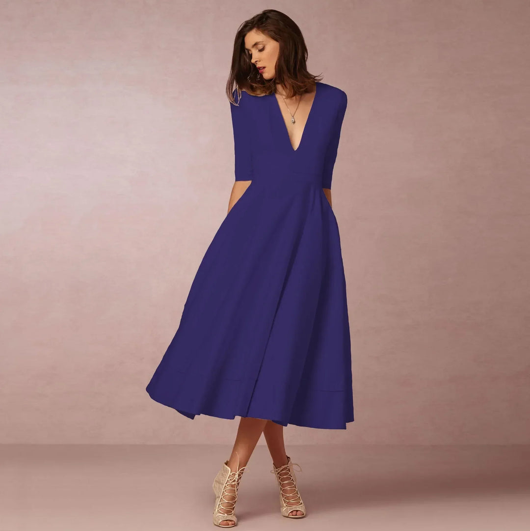 Purple elegant V-neck elbow-sleeve midi dress for women, versatile for any occasion.