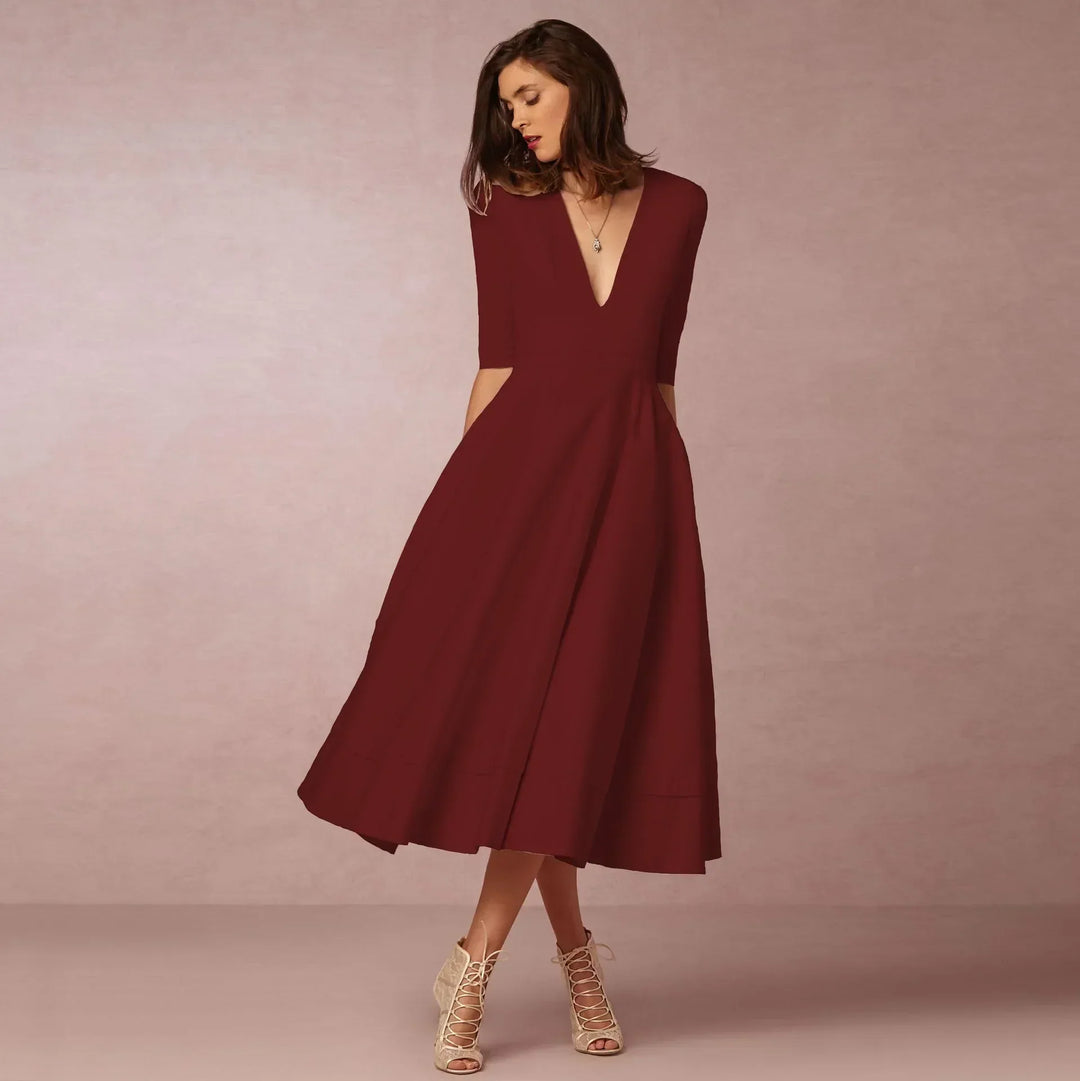Red sophisticated V-neck midi dress, elbow sleeves, ideal for elegant women's wear.