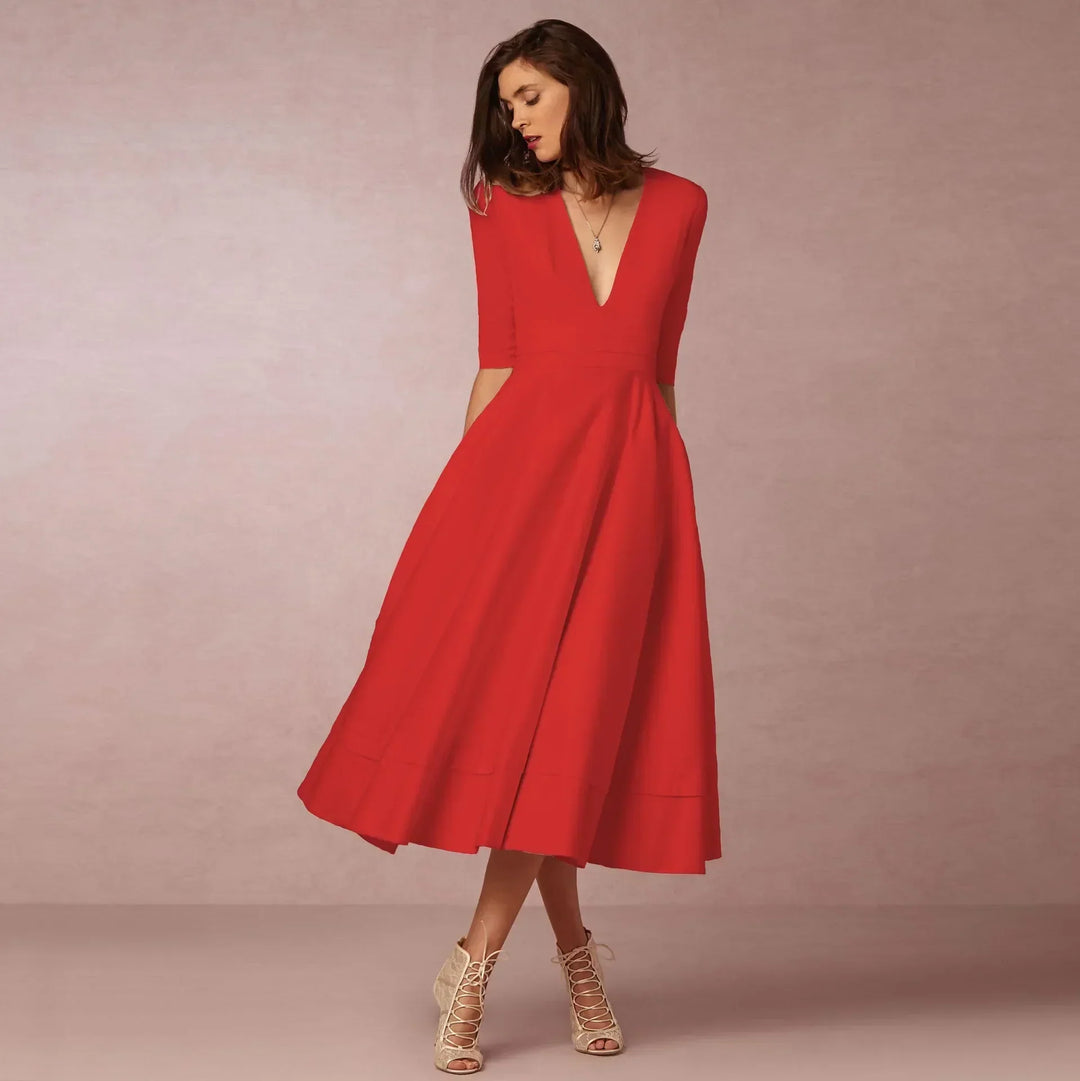 Versatile black V-neck elbow-sleeve midi dress for women, offering timeless casual elegance.