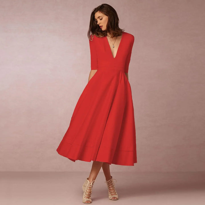 Versatile black V-neck elbow-sleeve midi dress for women, offering timeless casual elegance.