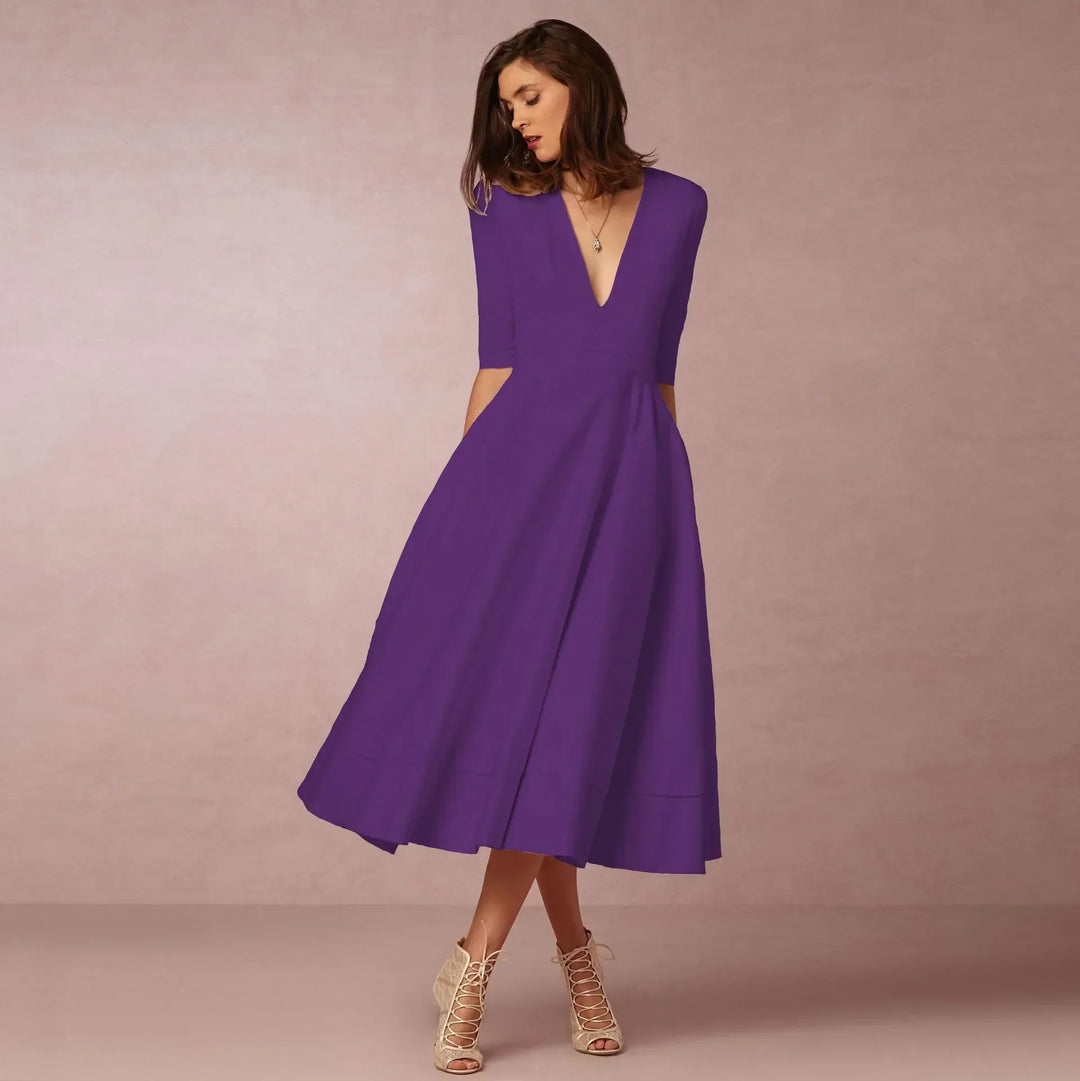 Elegant V-neck midi dress with elbow sleeves for women, a timeless piece for sophisticated style.
