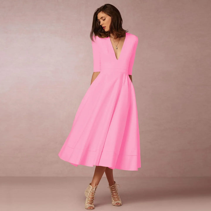 Women's sophisticated elbow-sleeve V-neck midi dress, perfect for elegant versatile wear.