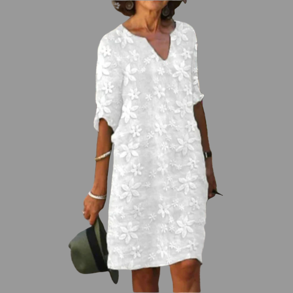 Elegant women's V-neck floral print midi dress, perfect for spring/summer casual or semi-formal occasions.