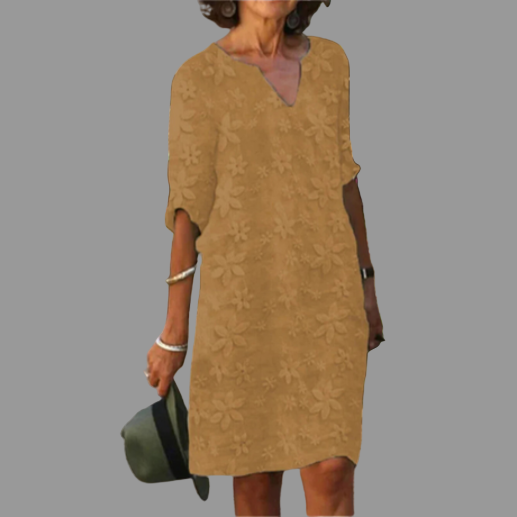 Chic women's V-neck floral midi dress, a versatile printed dress suitable for casual outings or elegant events.