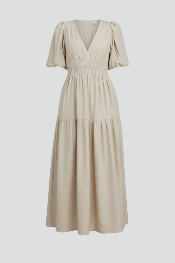 Elegant women's V-neck midi dress with stylish layered hem, perfect for versatile day-to-night fashion.