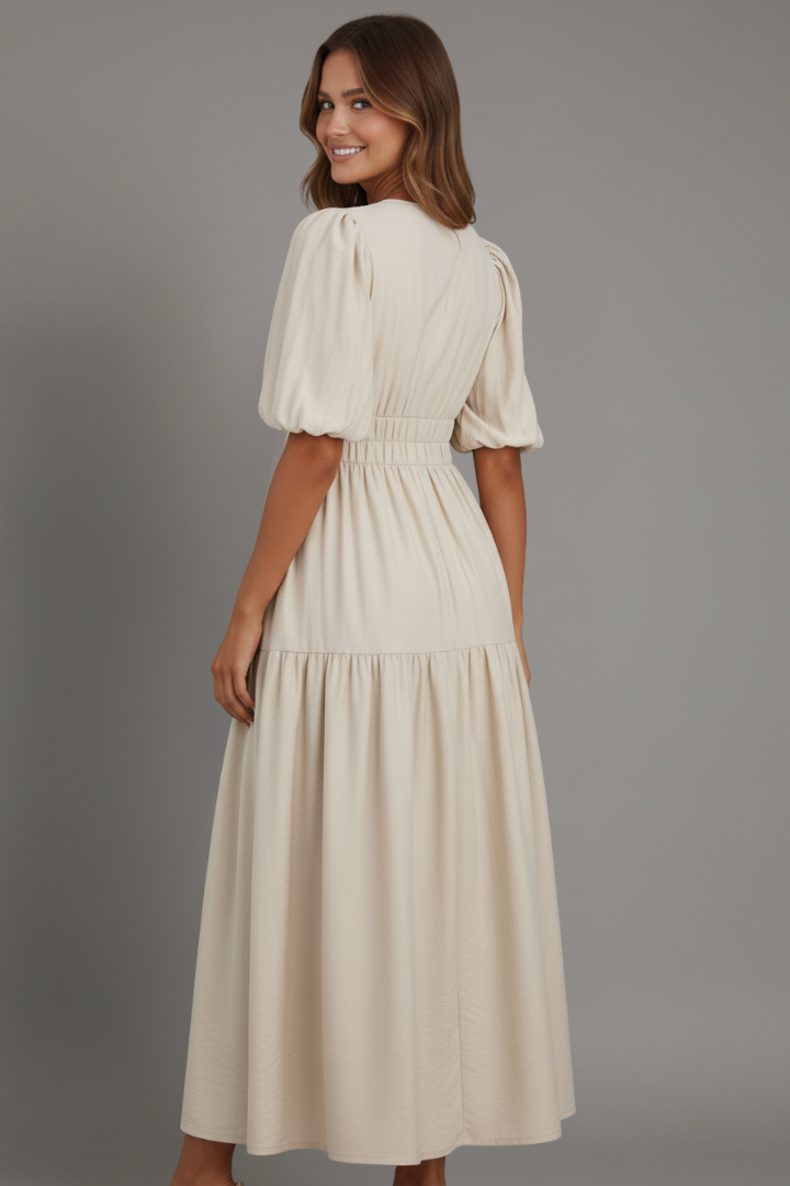 Versatile women's V-neck midi dress with elegant layered hem, suitable for casual chic or party occasions.