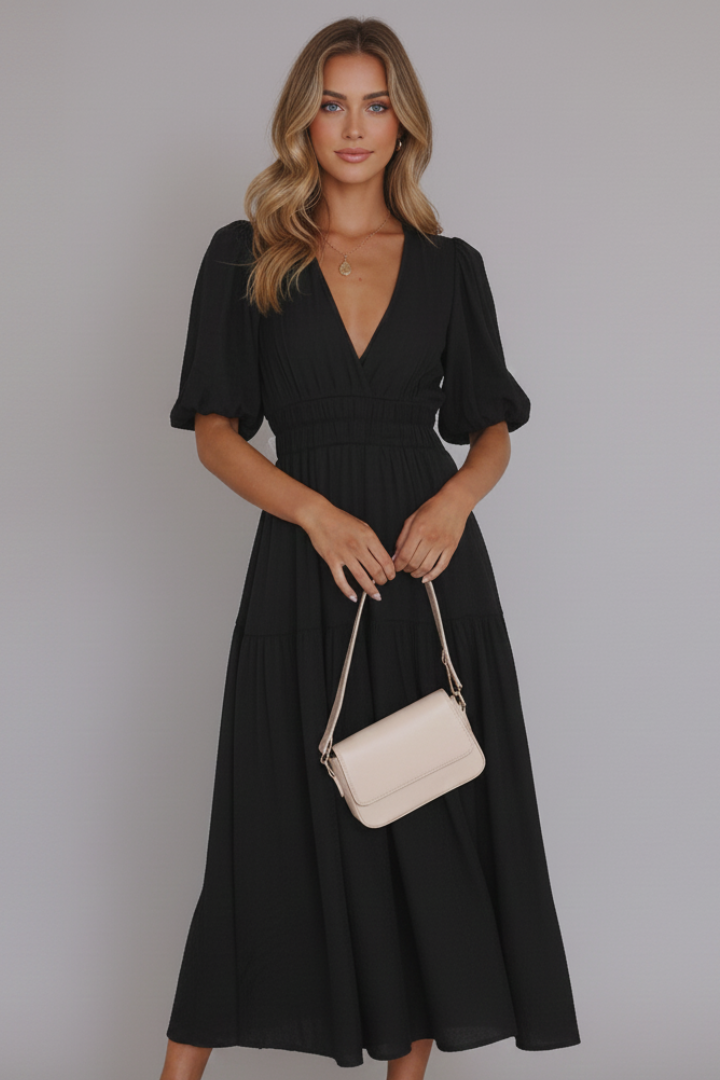 Comfortable & elegant women's V-neck midi dress. Features a flowing layered hem, ideal for summer fashion.