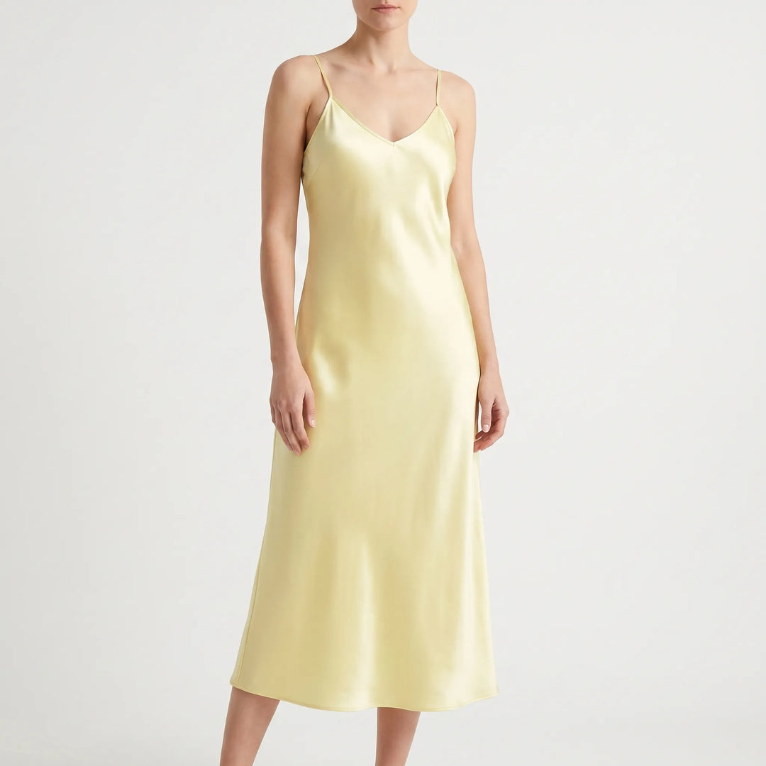 Chic women's V-neck A-line slip dress, a versatile midi for effortless style at casual outings or parties.