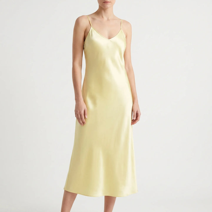 Chic women's V-neck A-line slip dress, a versatile midi for effortless style at casual outings or parties.