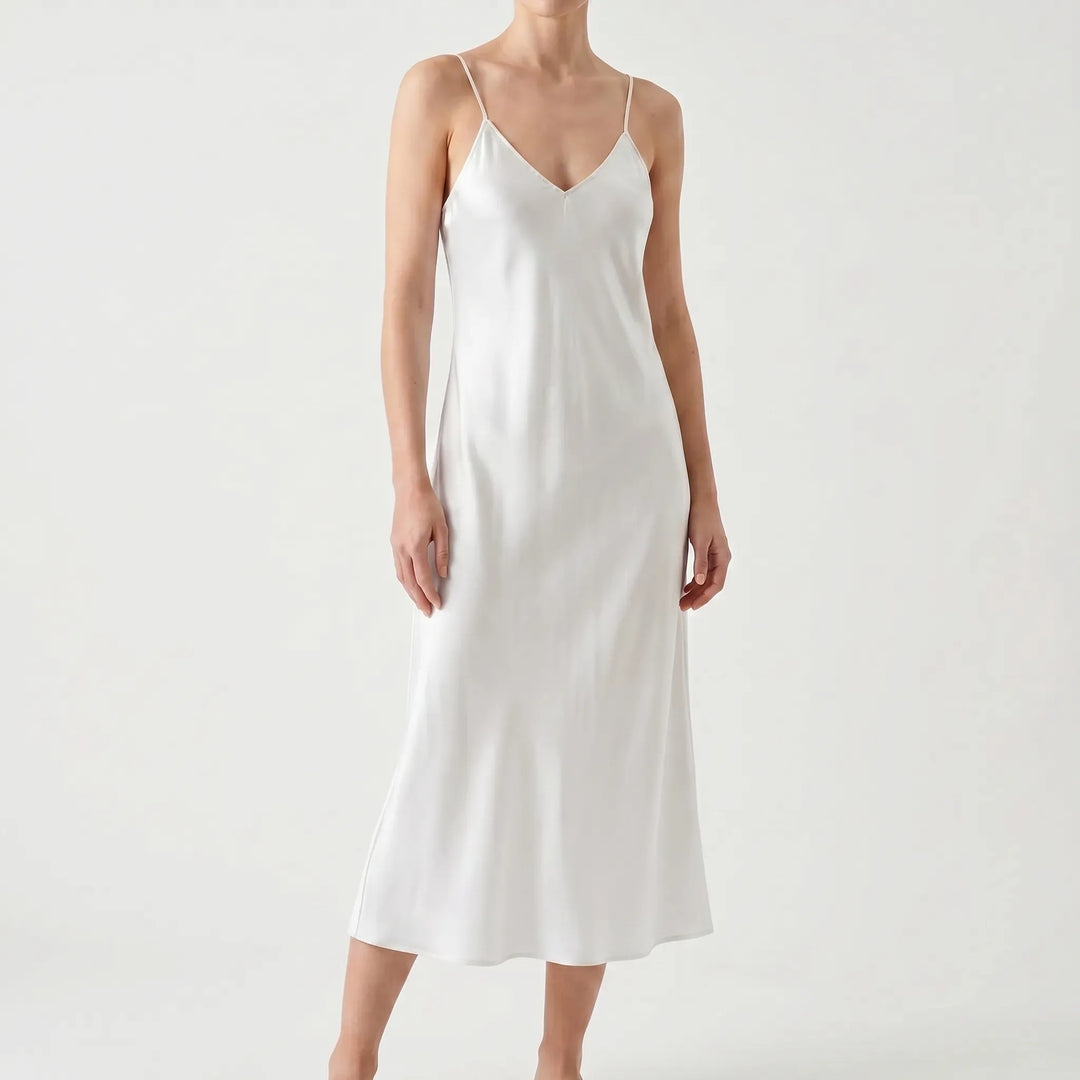 Beautiful women's pullover V-neck slip dress. A-line silhouette, perfect for elegant or casual fashion.