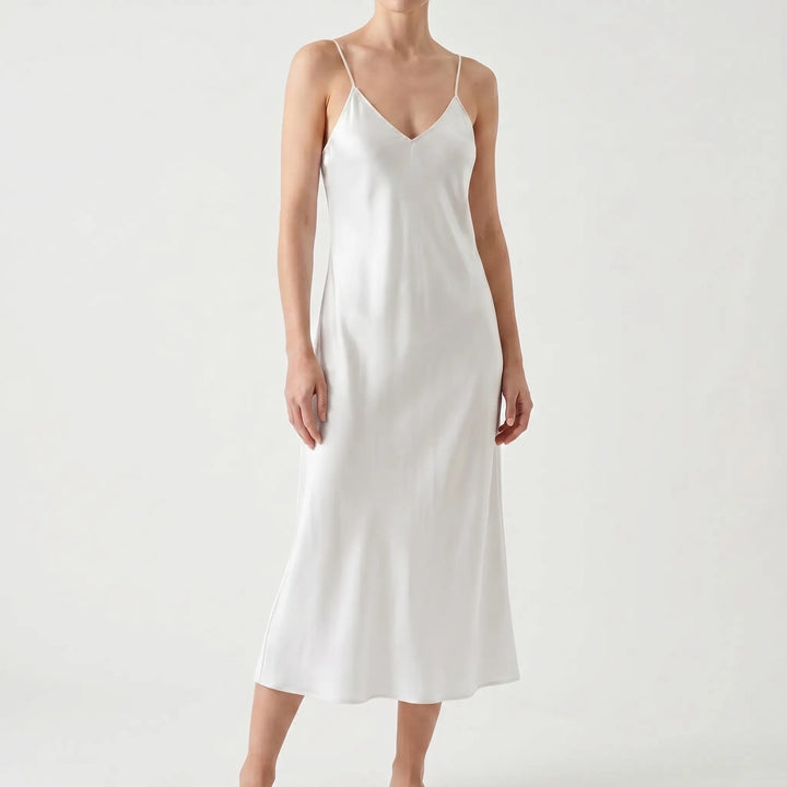Beautiful women's pullover V-neck slip dress. A-line silhouette, perfect for elegant or casual fashion.
