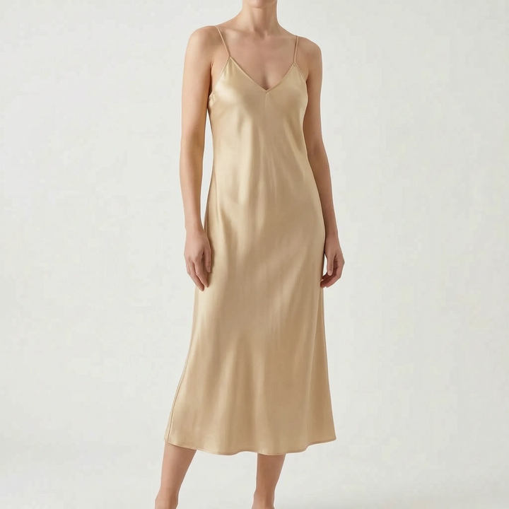 Effortless women's elegant V-neck midi slip dress, A-line cut, ideal for casual wear or sophisticated parties.
