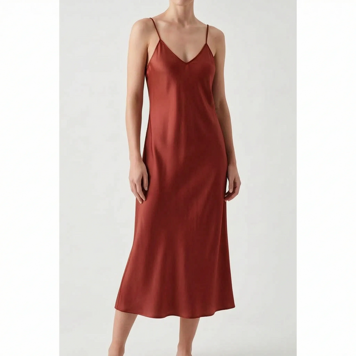 Casual yet elegant women's V-neck slip dress. Midi length, A-line cut, perfect for any event.