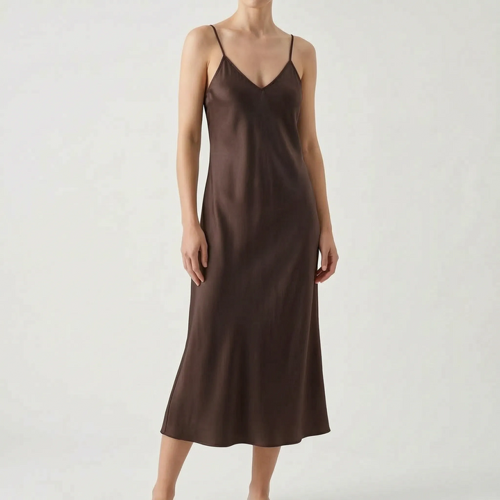 Pullover women's V-neck midi slip dress. Elegant and versatile, with spaghetti straps for stylish comfort.