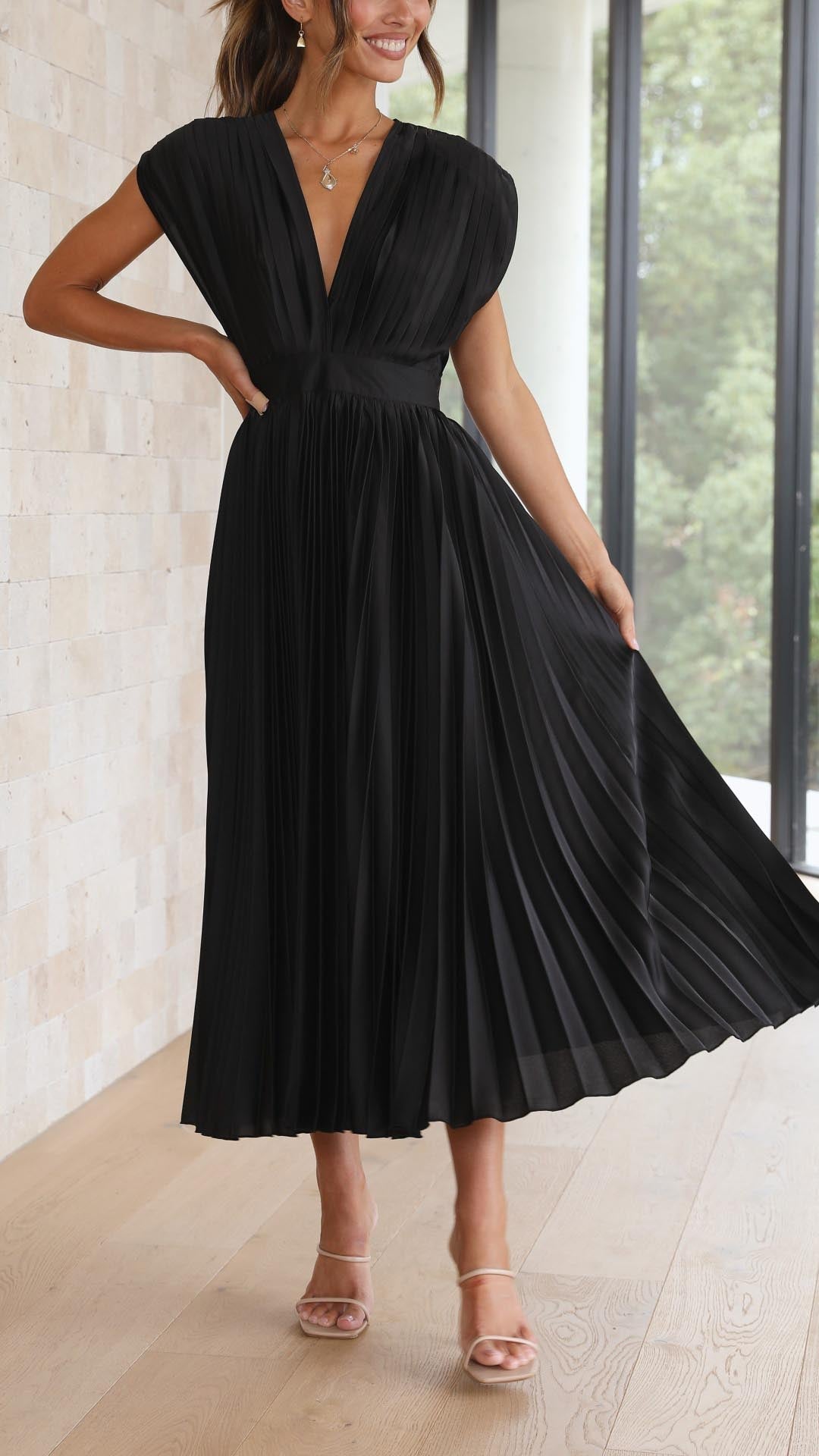 Elegant V-neck pleated maxi dress for women, perfect as a wedding guest or cocktail dress.