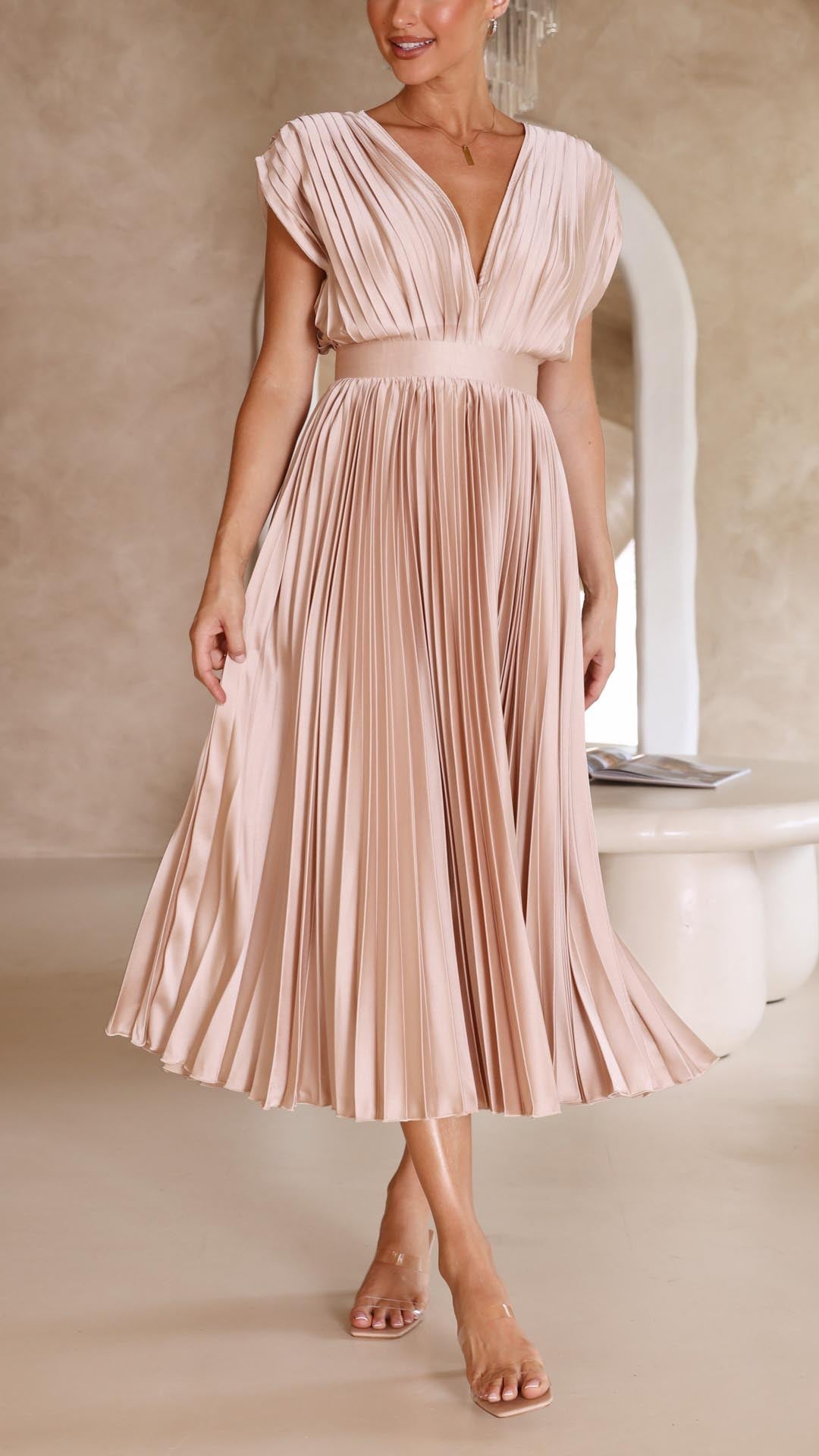 Women's elegant V-neck evening gown, a flowing pleated maxi dress for formal events.