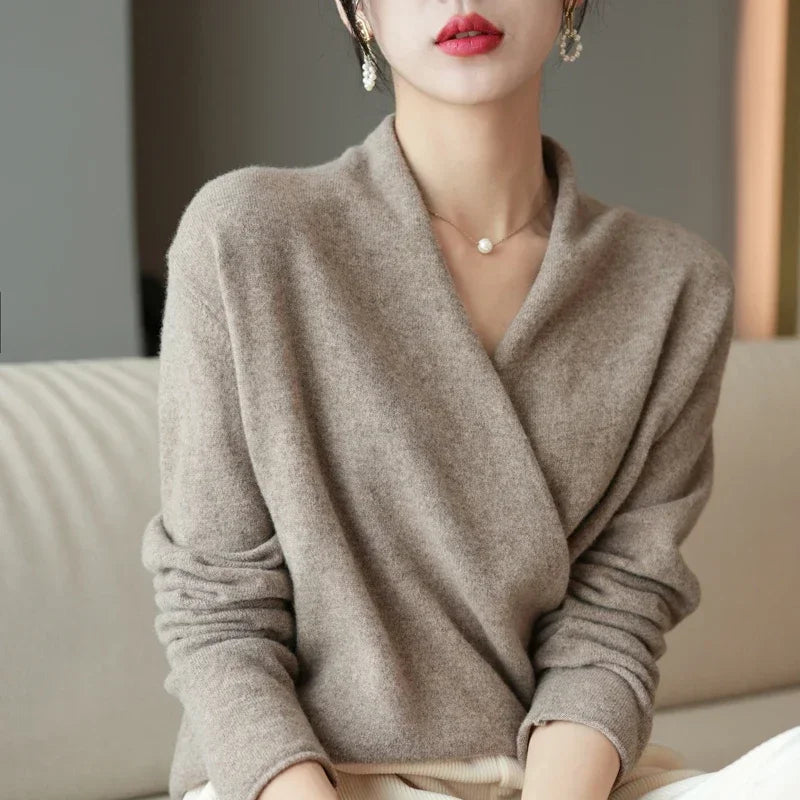 Elegant women's V-neck pullover sweater, perfect for versatile layering & chic winter fashion.
