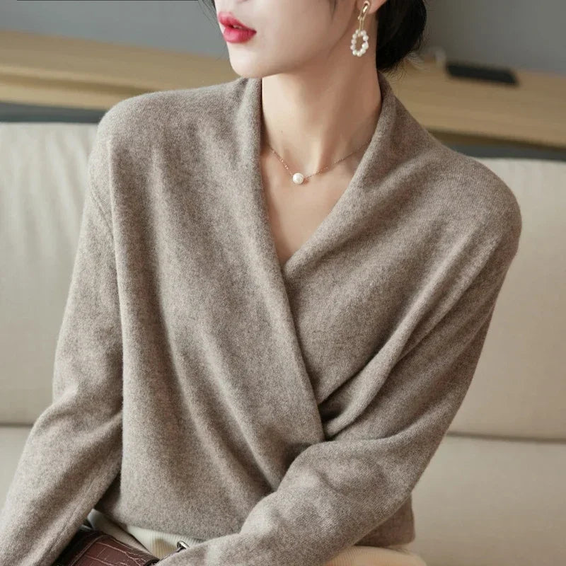 Cozy knit V-neck pullover for women, classic design, ideal elegant apparel & winter layering.