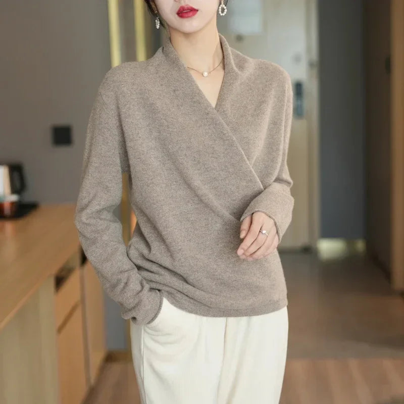 Chic women's V-neck sweater, a versatile pullover top, blending elegance with cozy knitwear.