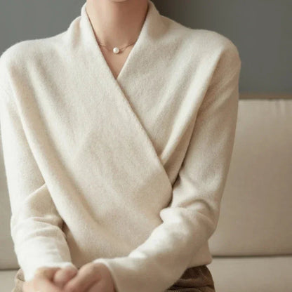 Stylish women's V-neck pullover sweater, featuring a classic design for elegant winter fashion.