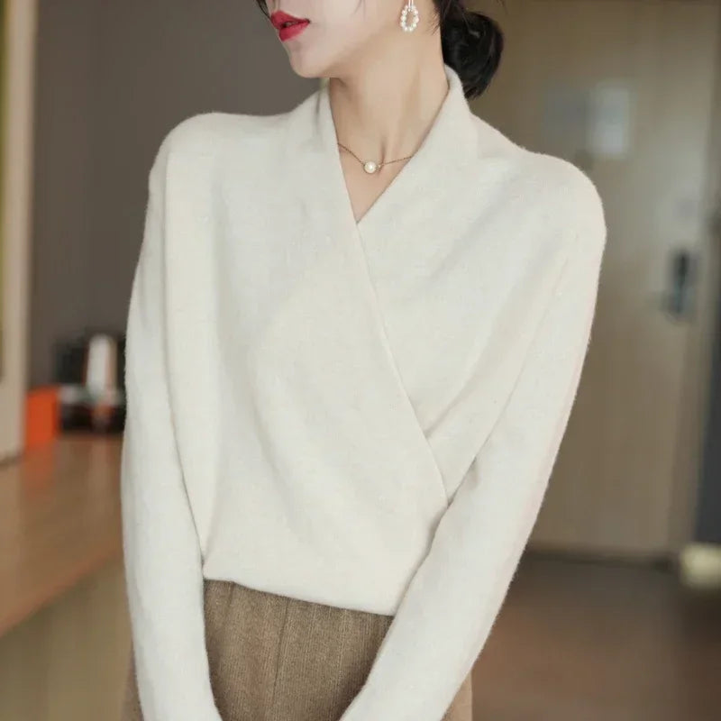 Classic women's V-neck pullover top, elegant apparel with a chic design, ideal for layering.