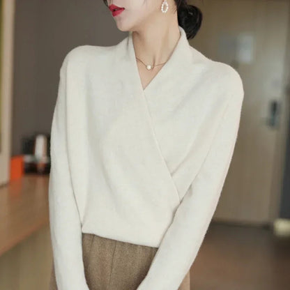Classic women's V-neck pullover top, elegant apparel with a chic design, ideal for layering.