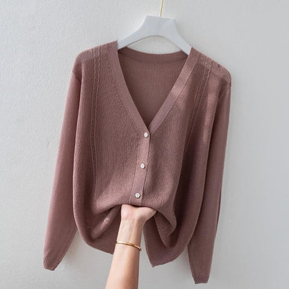 Soft, breathable women's V-neck knit top. Luxurious silk blend button-up sweater for comfortable & elegant women's fashion.