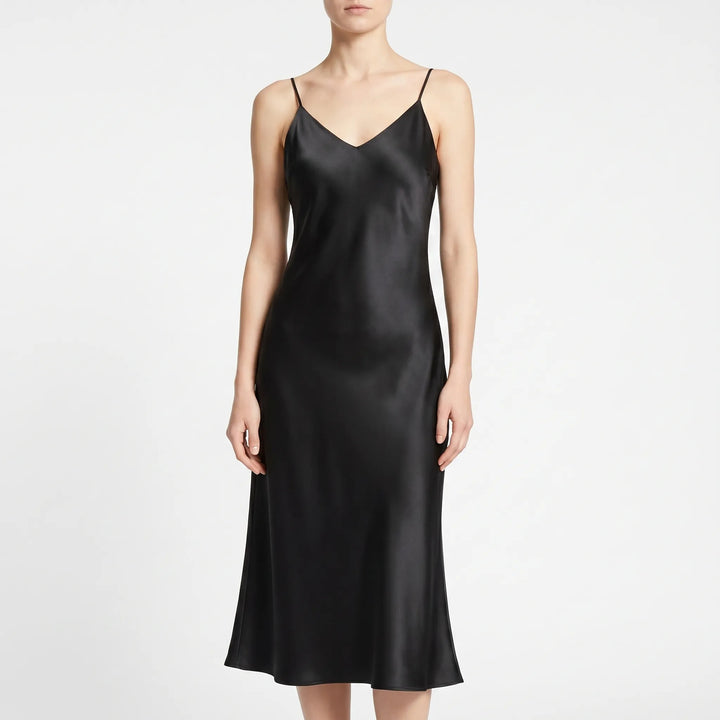 Chic V-neck slip midi dress for women, ideal for summer evenings, parties, and special occasions. Elegant sleeveless style.