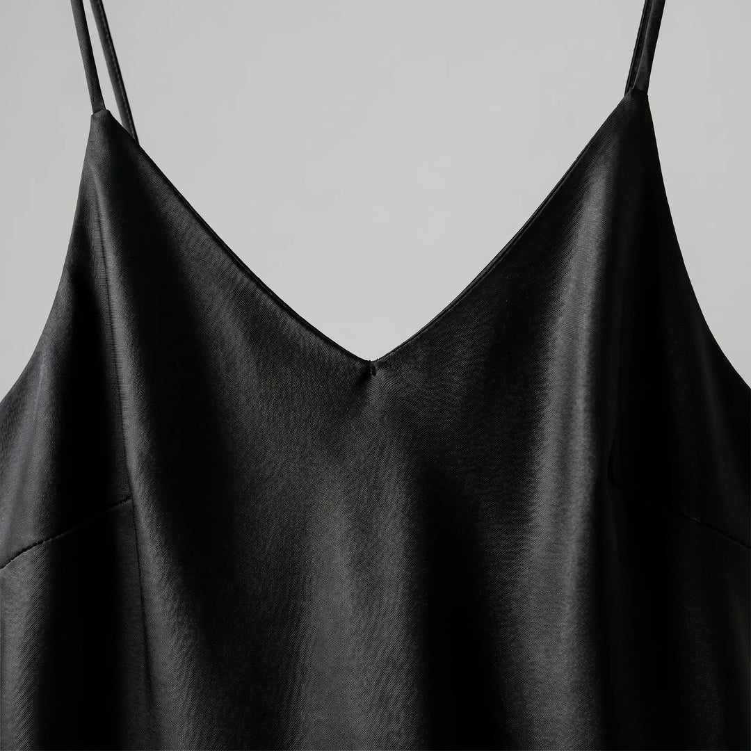 Women's elegant V-neck slip midi dress with a sleek A-line silhouette, perfect for sophisticated evening wear.