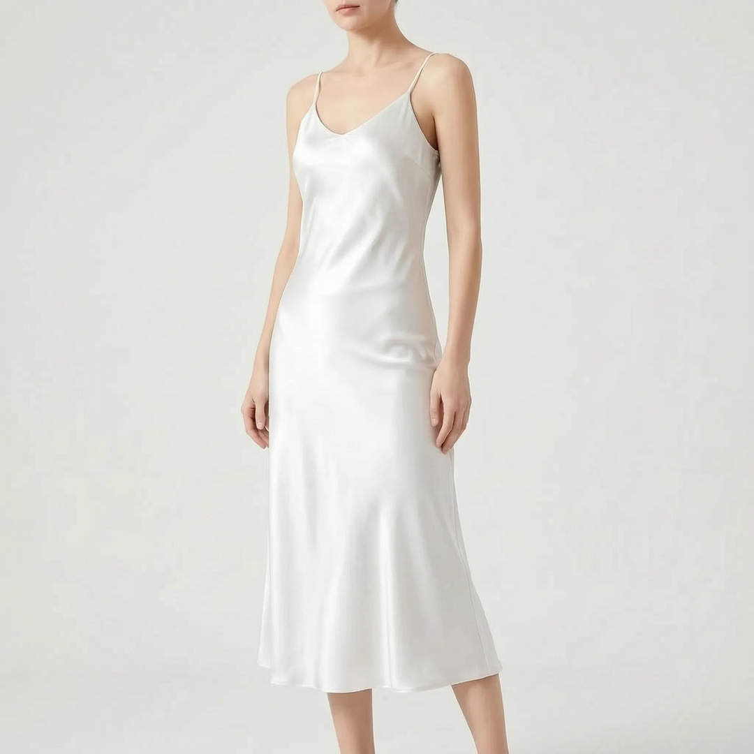 Flowy women's slip midi dress with V-neck, suitable for elegant evening events or chic summer cocktail parties.
