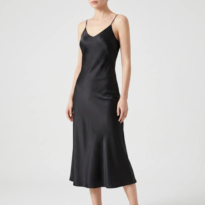 Women's elegant V-neck slip midi dress. Sleeveless A-line evening dress, perfect for cocktail parties and summer events.