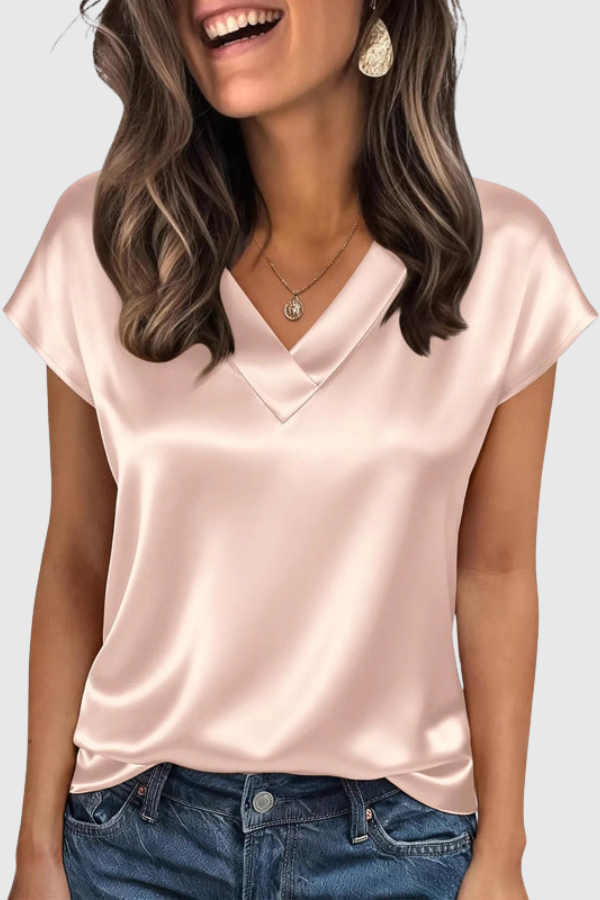 Elegant women's V-neck summer blouse in a soft fabric, perfect for chic casual or office wear.