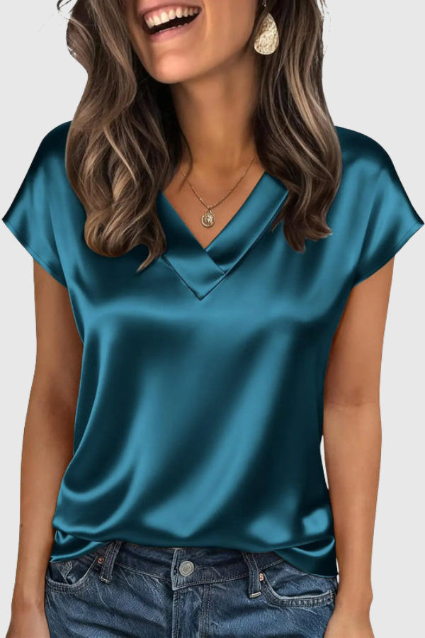 Stylish women's V-neck shirt, a comfortable and elegant summer blouse perfect for any occasion.
