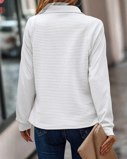 Elegant lightweight V-neck sweater for women. Comfortable long sleeve knit, ideal for spring/summer fashion.