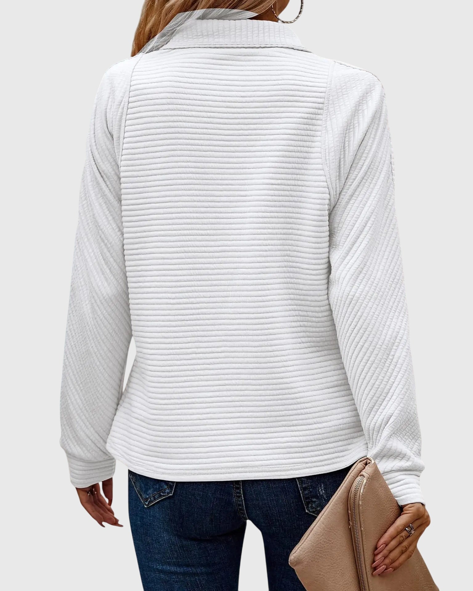Women's fashionable V-neck zipper sweater. A versatile, long sleeve piece for an elegant casual chic style.