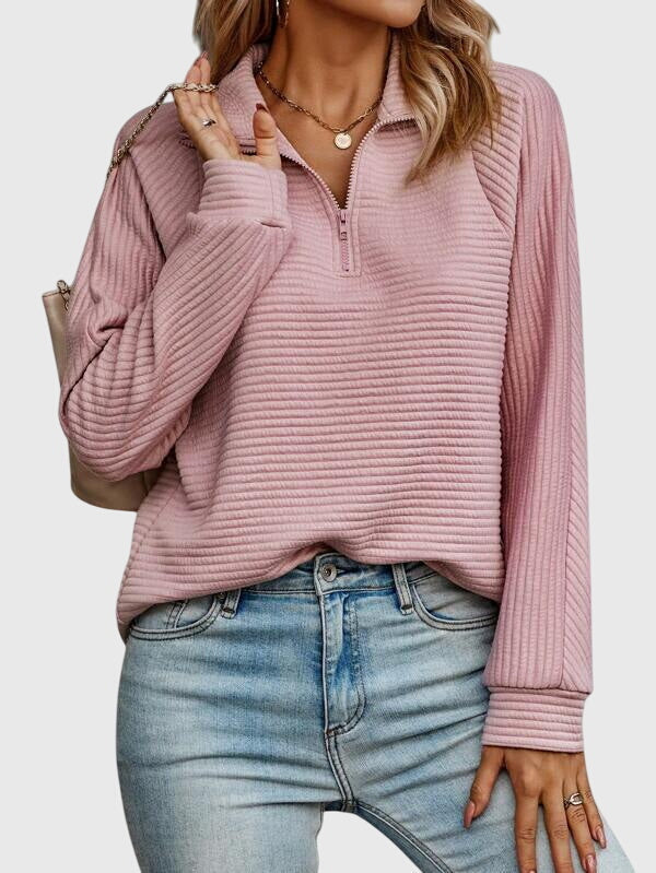 Stylish women's zipper V-neck sweater, versatile for casual chic outfits. Comfortable long sleeve.